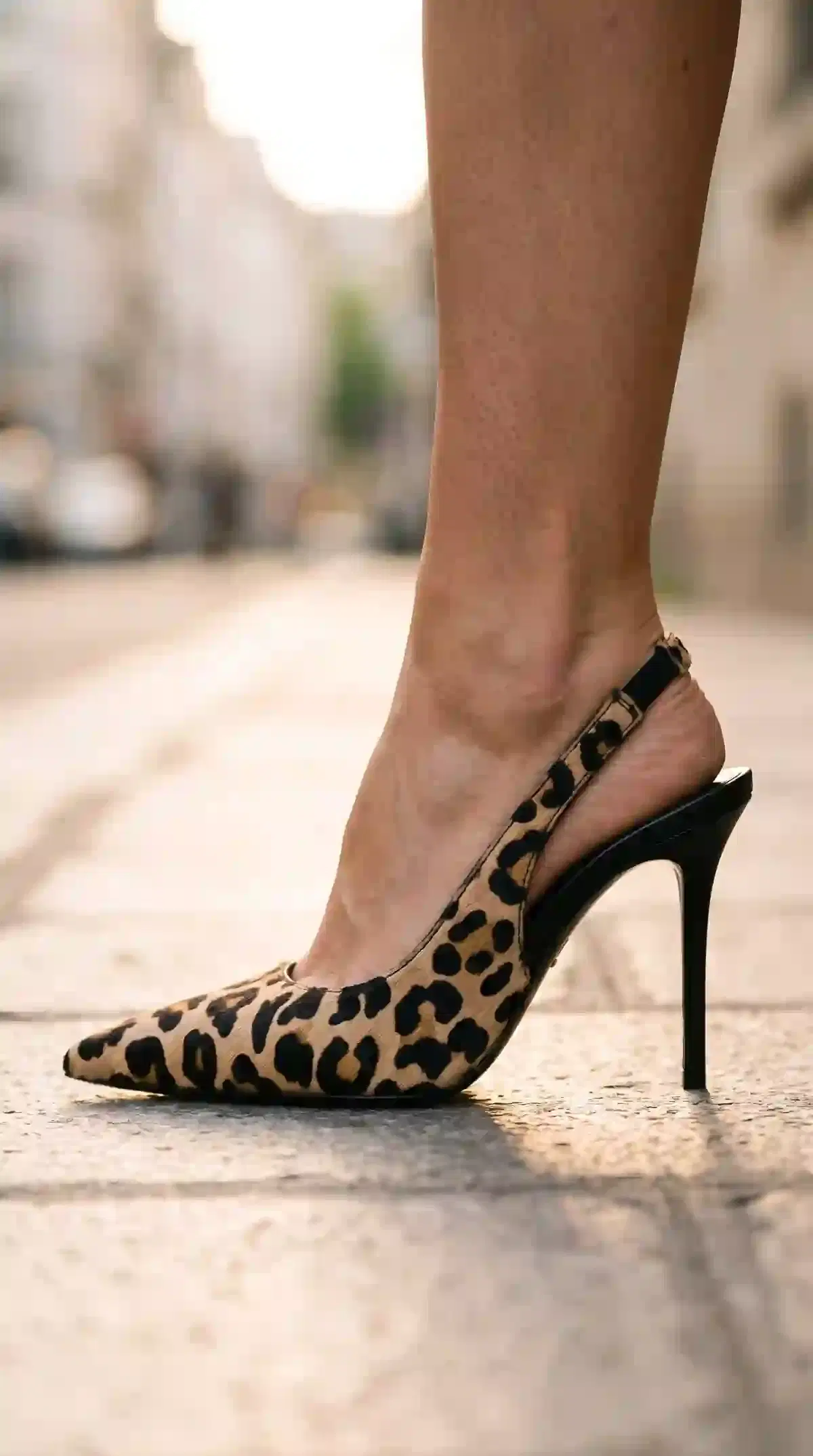 VOLEECE leopard calf hair slingback recreated in the same Milan street scene