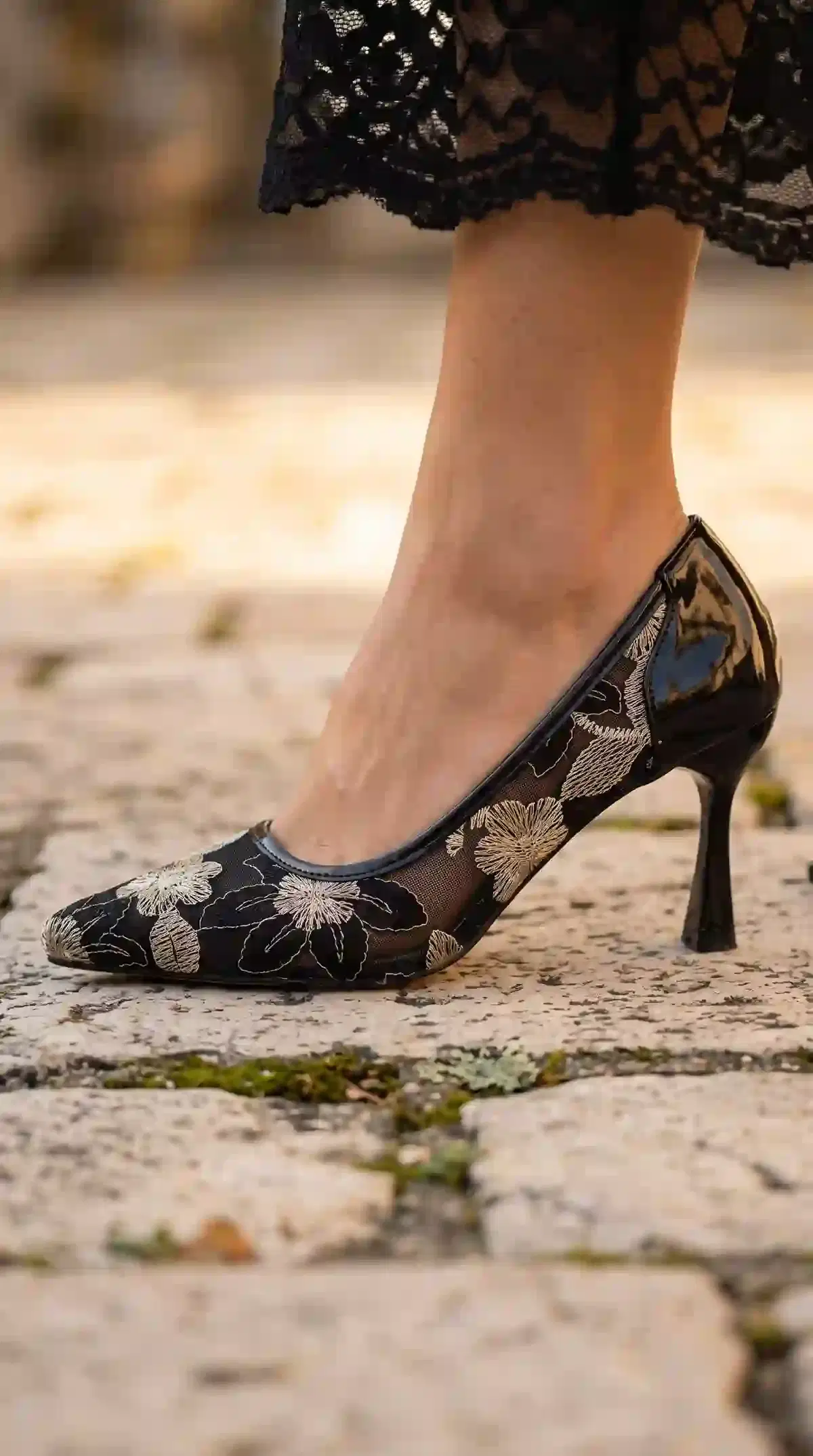 Black embroidered mesh pointed stiletto pump recreated in the same garden scene